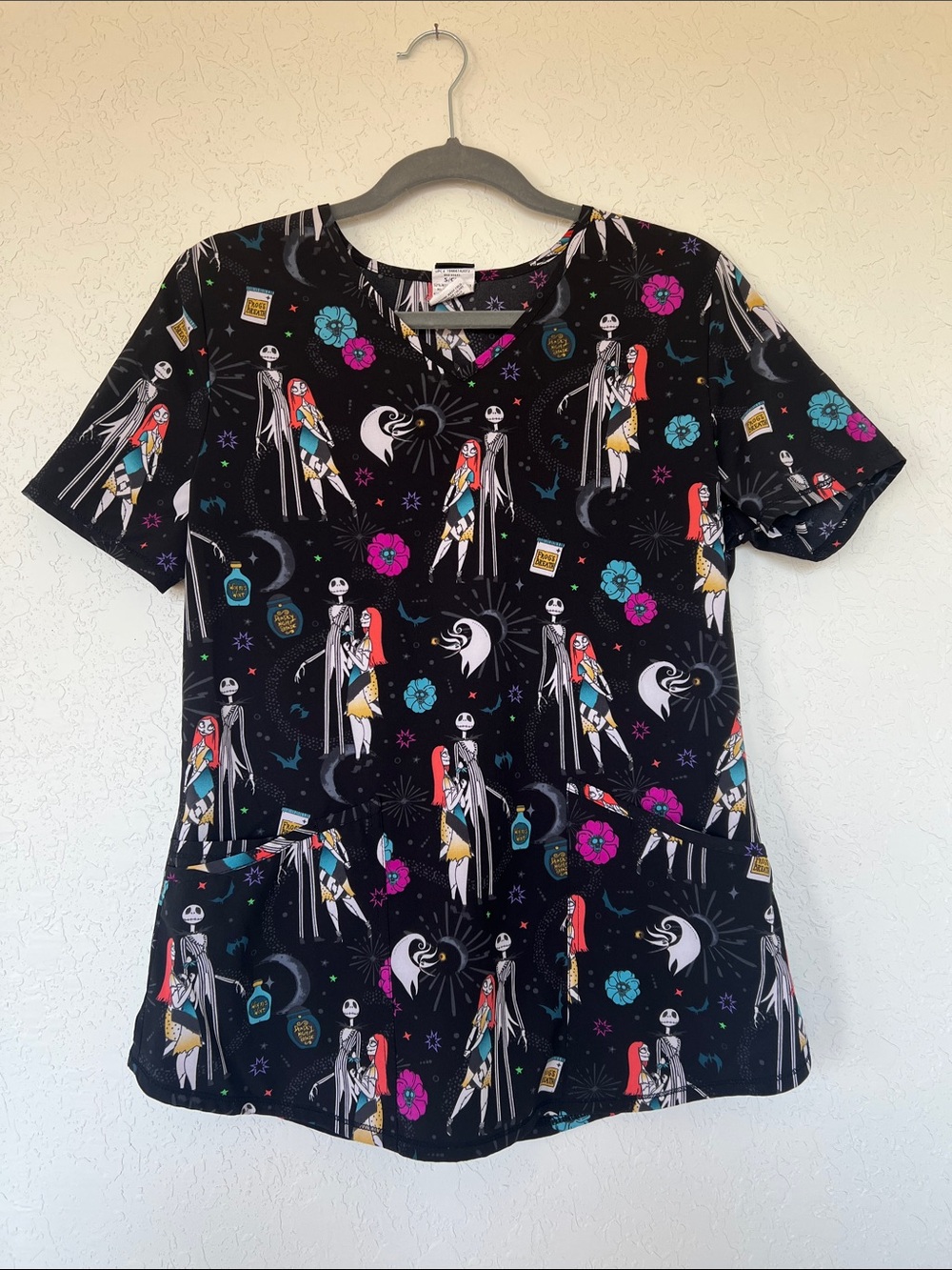 Disney Black Night-Themed Women's Scrub Top with Colorful Characters